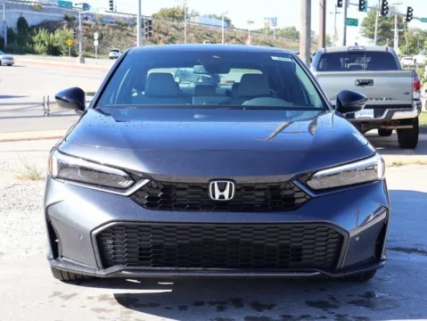 Photos of 2026 Honda Civic Sedan Hybrid Sport Touring for sale in Kansas City, MO at Jay Wolfe Honda