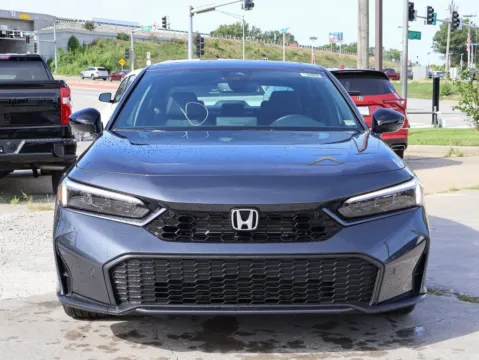 Photos of 2026 Honda Civic Sedan Hybrid Sport Touring for sale in Kansas City, MO at Jay Wolfe Honda