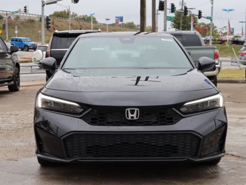 Photos of 2026 Honda Civic Sedan Hybrid Sport Touring for sale in Kansas City, MO at Jay Wolfe Honda