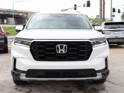 Photos of 2025 Honda Pilot Touring+ for sale in Kansas City, MO at Jay Wolfe Honda