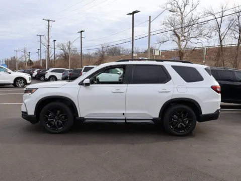 Photos of 2025 Honda Pilot Touring+ for sale in Kansas City, MO at Jay Wolfe Honda