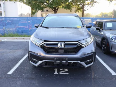 Photos of 2021 Honda CR-V Hybrid Touring for sale in Kansas City, MO at Jay Wolfe Honda