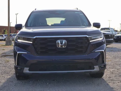 Photos of 2025 Honda Pilot Touring for sale in Kansas City, MO at Jay Wolfe Honda