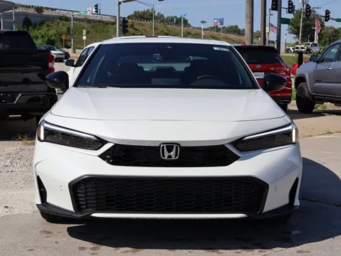 Photos of 2026 Honda Civic Sedan Hybrid Sport Touring for sale in Kansas City, MO at Jay Wolfe Honda