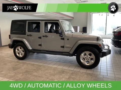 Silver 2015 Jeep Wrangler Unlimited Sahara for sale in Kansas City, MO