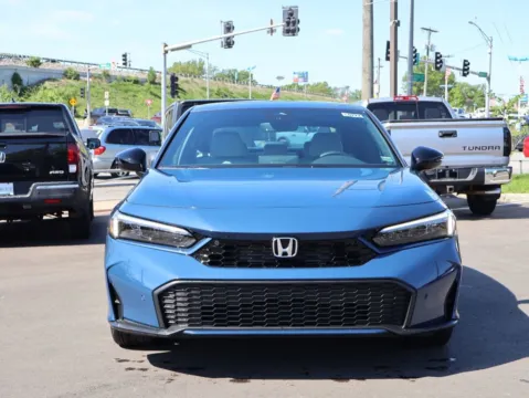 Photos of 2026 Honda Civic Sedan Hybrid Sport Touring for sale in Kansas City, MO at Jay Wolfe Honda