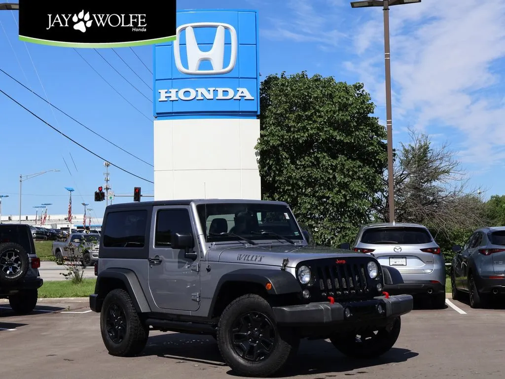 Silver 2017 Jeep Wrangler Willys Wheeler for sale in Kansas City, MO
