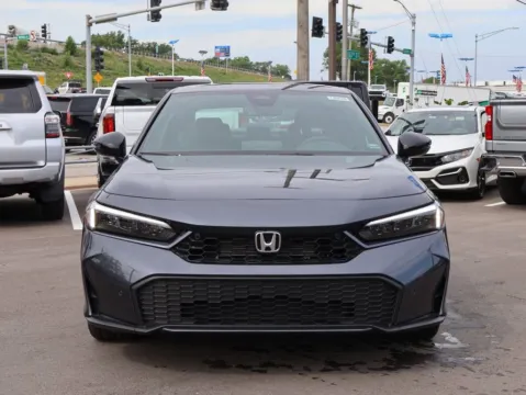 Photos of 2026 Honda Civic Sedan Hybrid Sport Touring for sale in Kansas City, MO at Jay Wolfe Honda