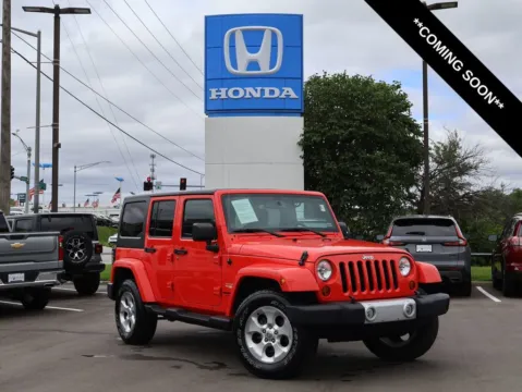Red 2013 Jeep Wrangler Unlimited Sahara for sale in Kansas City, MO