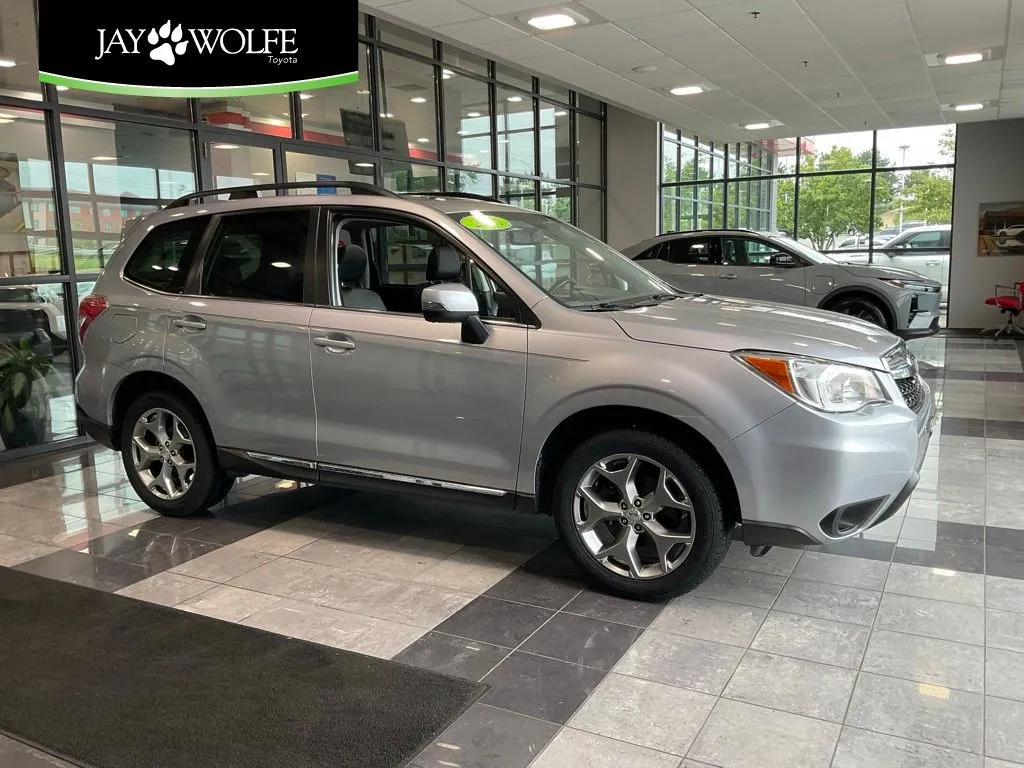 Silver 2016 Subaru Forester 2.5i Touring for sale in Kansas City, MO
