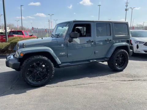 Another view of 2014 Jeep Wrangler Unlimited Sahara for sale in Kansas City, MO at Jay Wolfe Acura