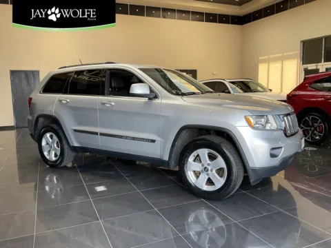 Silver 2013 Jeep Grand Cherokee Laredo for sale in Kansas City, MO