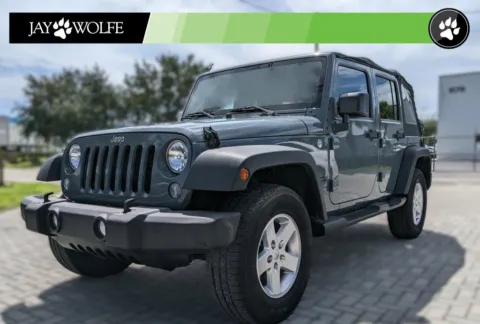 Gray 2015 Jeep Wrangler Unlimited Sport for sale in Kansas City, MO