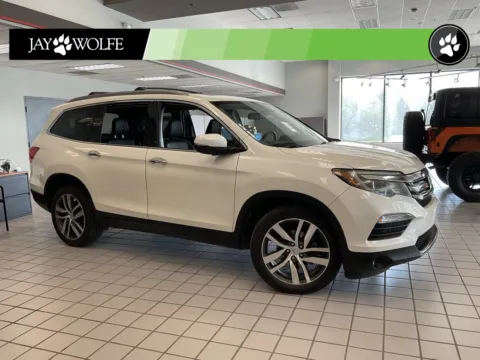 Red 2016 Honda Pilot Elite for sale in Kansas City, MO