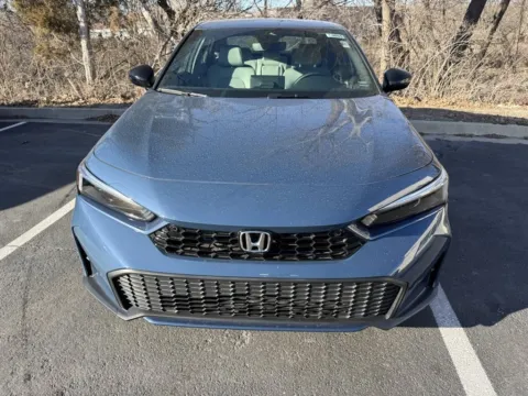 Photos of 2026 Honda Civic Sedan Hybrid Sport Touring for sale in Kansas City, MO at Jay Wolfe Honda