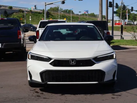 Photos of 2026 Honda Civic Sedan Hybrid Sport Touring for sale in Kansas City, MO at Jay Wolfe Honda