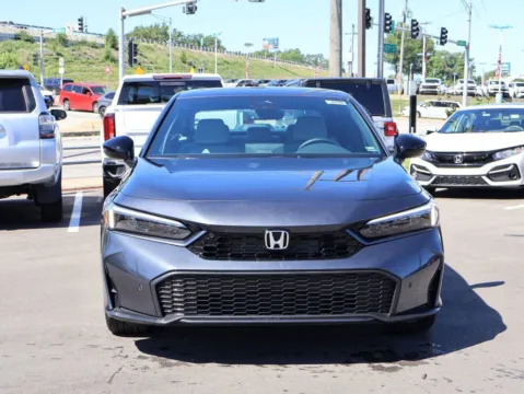 Photos of 2026 Honda Civic Sedan Hybrid Sport Touring for sale in Kansas City, MO at Jay Wolfe Honda