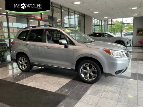 Silver 2016 Subaru Forester 2.5i Touring for sale in Kansas City, MO