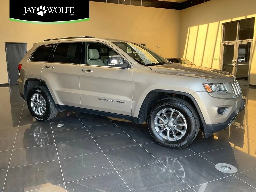 Beige 2014 Jeep Grand Cherokee Limited for sale in Kansas City, MO