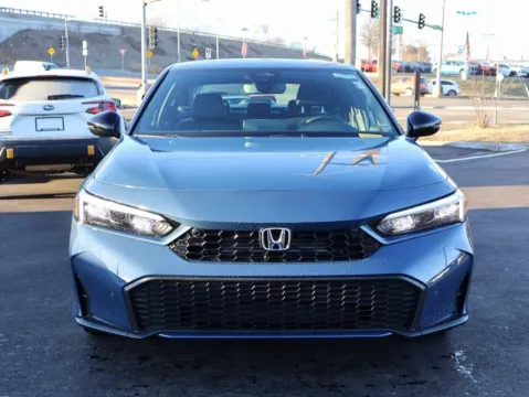 Photos of 2026 Honda Civic Sedan Hybrid Sport Touring for sale in Kansas City, MO at Jay Wolfe Honda