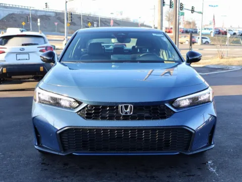 Photos of 2026 Honda Civic Sedan Hybrid Sport Touring for sale in Kansas City, MO at Jay Wolfe Honda