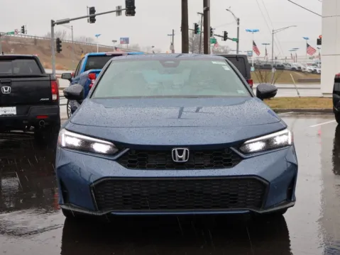 Photos of 2026 Honda Civic Sedan Hybrid Sport Touring for sale in Kansas City, MO at Jay Wolfe Honda