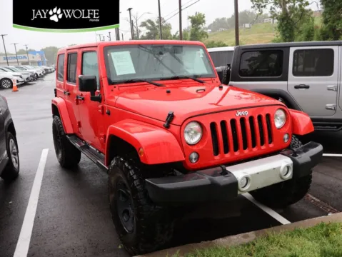 Red 2015 Jeep Wrangler Unlimited Sahara for sale in Kansas City, MO