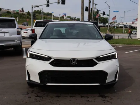 Photos of 2026 Honda Civic Sedan Hybrid Sport Touring for sale in Kansas City, MO at Jay Wolfe Honda