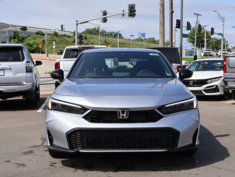 Photos of 2026 Honda Civic Sedan Hybrid Sport Touring for sale in Kansas City, MO at Jay Wolfe Honda