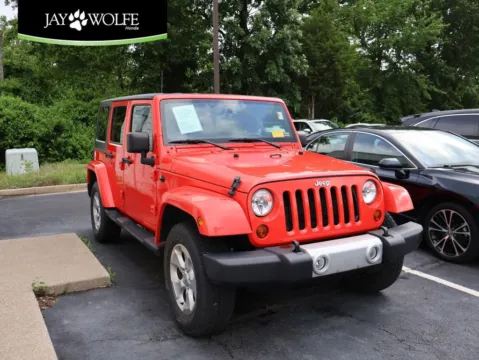 Red 2013 Jeep Wrangler Unlimited Sahara for sale in Kansas City, MO