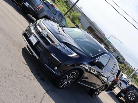 Another view of 2019 Honda Pilot Touring 8-Passenger for sale in Kansas City, MO at Jay Wolfe Honda
