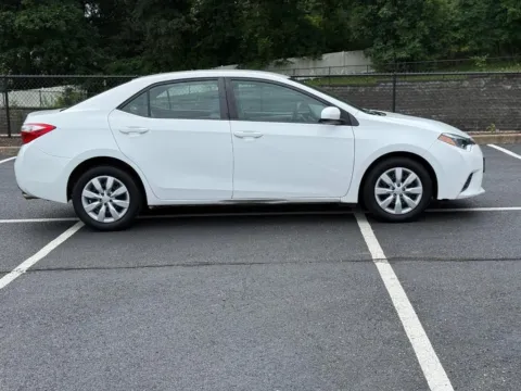 Photos of 2014 Toyota Corolla LE for sale in Ballwin, MO at Jay Wolfe Toyota of West County