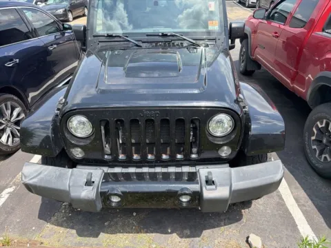 Photos of 2017 Jeep Wrangler Unlimited Smoky Mountain for sale in Kansas City, MO at Jay Wolfe Acura