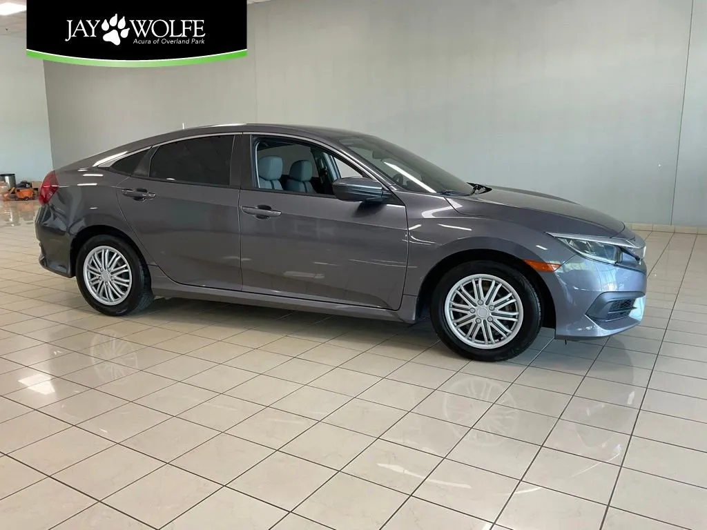 Used 2016 Honda Civic LX with VIN 19XFC2F50GE217324 for sale in Kansas City