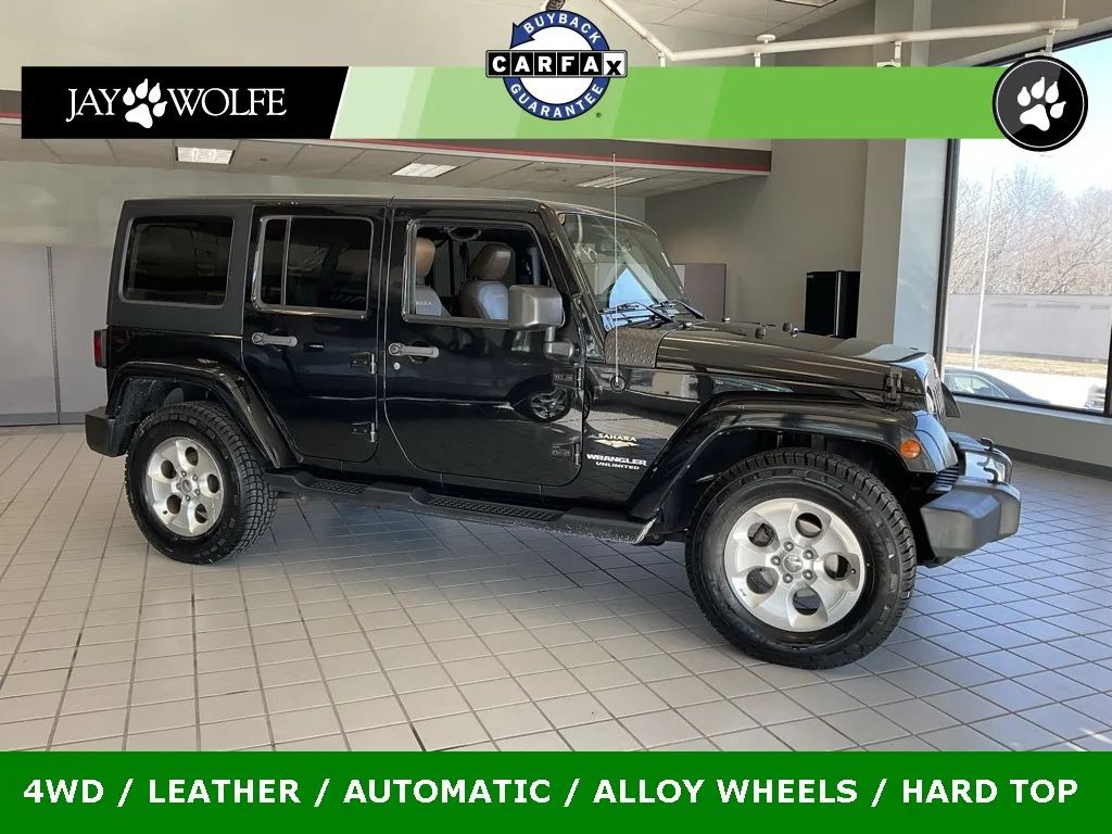 Black 2015 Jeep Wrangler Unlimited Sahara for sale in Kansas City, MO