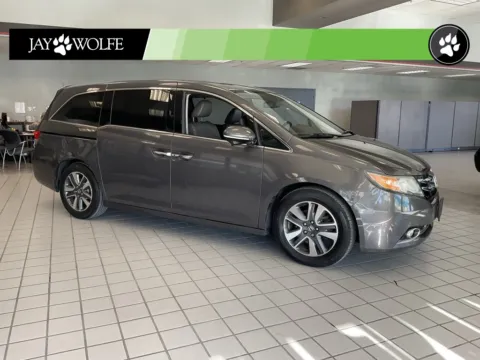 Red 2016 Honda Odyssey Touring for sale in Kansas City, MO