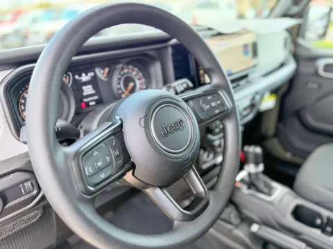 Another view of 2026 Jeep Wrangler Sport for sale in Gulfport, MS at Champion Chrysler Dodge Jeep Ram