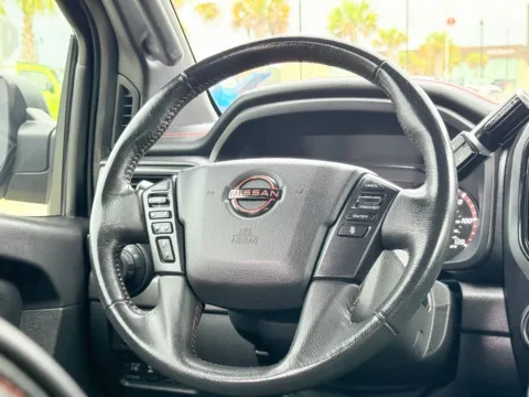 Photos of 2023 Nissan Titan PRO-4X for sale in Gulfport, MS at Champion Chrysler Dodge Jeep Ram