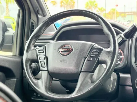 Photos of 2023 Nissan Titan PRO-4X for sale in Gulfport, MS at Champion Chrysler Dodge Jeep Ram