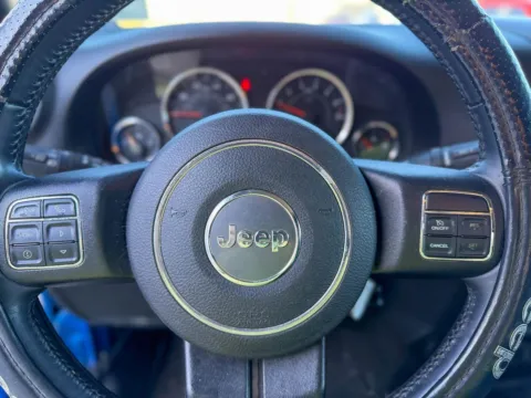 Photos of 2015 Jeep Wrangler Sport for sale in Gulfport, MS at Champion Chrysler Dodge Jeep Ram