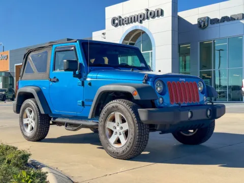 Blue 2015 Jeep Wrangler Sport for sale in Gulfport, MS
