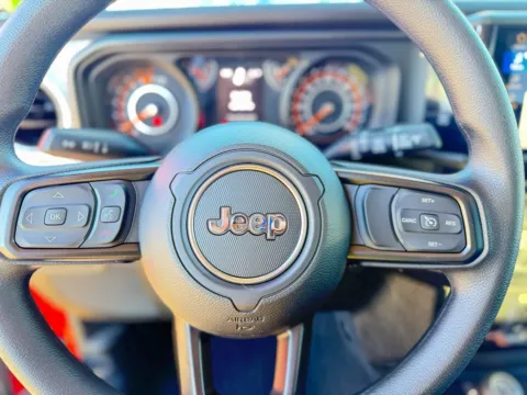 Photos of 2026 Jeep Wrangler Sport for sale in Gulfport, MS at Champion Chrysler Dodge Jeep Ram