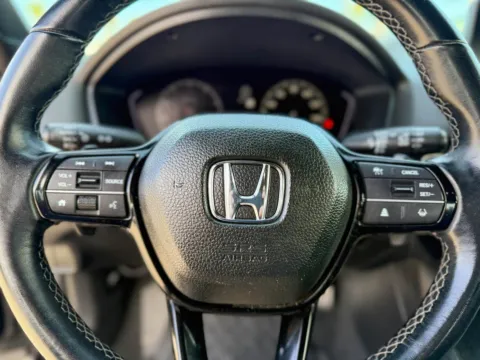 Photos of 2024 Honda Civic Hatchback Sport for sale in Gulfport, MS at Champion Chrysler Dodge Jeep Ram