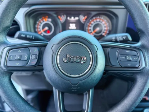 Photos of 2026 Jeep Wrangler Sport for sale in Gulfport, MS at Champion Chrysler Dodge Jeep Ram