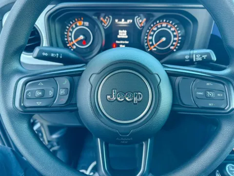 Photos of 2026 Jeep Wrangler Sport for sale in Gulfport, MS at Champion Chrysler Dodge Jeep Ram