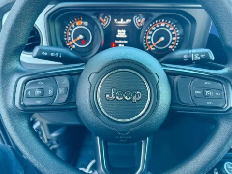 Photos of 2026 Jeep Wrangler Sport for sale in Gulfport, MS at Champion Chrysler Dodge Jeep Ram