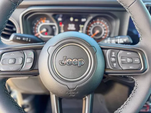 Photos of 2026 Jeep Wrangler Rubicon for sale in Gulfport, MS at Champion Chrysler Dodge Jeep Ram