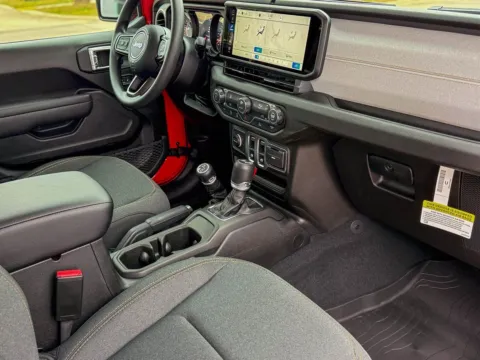 Another view of 2026 Jeep Wrangler Sport for sale in Gulfport, MS at Champion Chrysler Dodge Jeep Ram