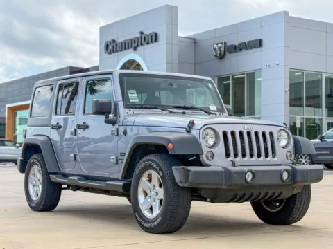 Silver 2016 Jeep Wrangler Unlimited Sport for sale in Gulfport, MS