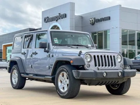 Silver 2016 Jeep Wrangler Unlimited Sport for sale in Gulfport, MS